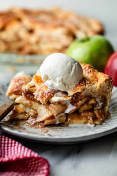 a slice of apple pie with ice cream on top