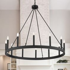 a chandelier hanging from the ceiling in a living room