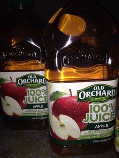 two bottles of old orchard apple juice