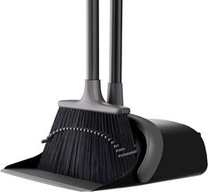 two black brooms sitting on top of each other