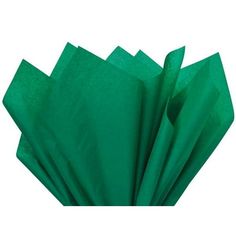 green tissue paper folded on top of each other