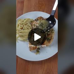 a white plate topped with meat covered in gravy next to pasta and broccoli