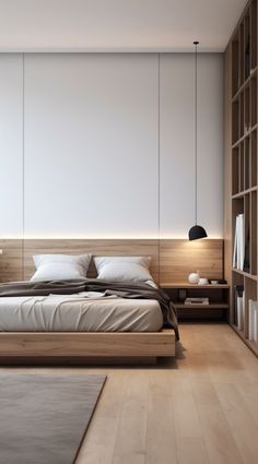 a large bed sitting in the middle of a bedroom next to a book shelf filled with books