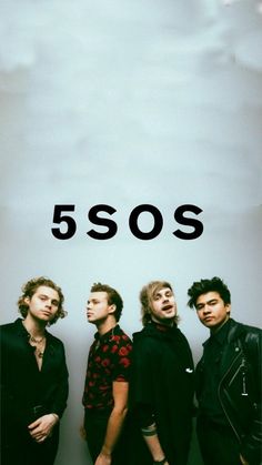 five young men standing next to each other in front of a white wall with the word 5 sos on it