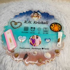 an assortment of personal items are displayed on a white furnishing area with the name kt rishali written in it