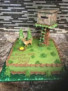 a birthday cake with a deer on it