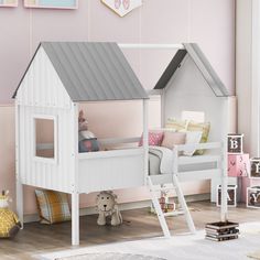 a child's bedroom with pink walls and white bunk beds, toys and decor