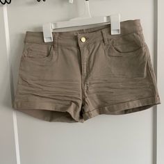 Brand: H&M Size: 8 Color: Khaki Never Worn, New With Tags Trendy Fitted H&m Shorts, H&m Brown Bottoms For Spring, Affordable H&m Casual Shorts, Brown Casual Bottoms From H&m, H&m High-waisted Cotton Shorts, H&m Brown Casual Bottoms, H&m Fitted Cotton Shorts, Fitted Cotton Shorts By H&m, Womens Khaki Shorts