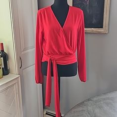 Red Wrap Top, So Versatile And Such A Fun Addition To Any Wardrobe! Chic Red Blouse For Evening, Chic Red Party Blouse, Red Long Sleeve Blouse For Evening, Chic Red Long Sleeve Blouse, Red Evening Blouse For Spring, Red V-neck Tops For Brunch, Red V-neck Tops For Evening, Chic Red V-neck Blouse, Red V-neck Evening Tops