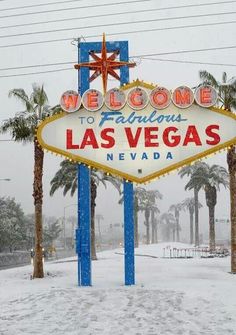 the welcome to fabulous las vegas sign is covered in snow