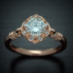 an engagement ring is shown with diamonds on it