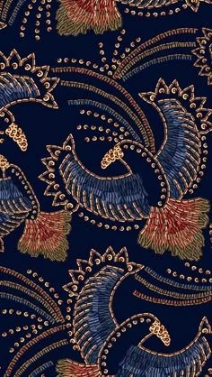 a blue background with gold and red designs