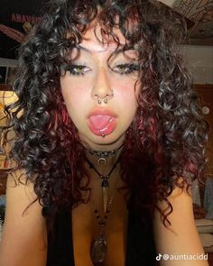 Half Colored Hair Underneath Curly Hair, Curly Hair With Red Underneath, Dark Brown Hair With Dark Red Underneath, Red Under Dye Curly Hair, Grunge Hair Dye Ideas Curly, Brown And Red Curly Hair, Purple Peekaboo Curly Hair, Red Skunk Stripe Hair Curly, Peak A Boo Curly Hair