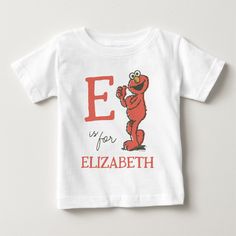 a white t - shirt with the letter e on it's chest and an image of a cartoon character