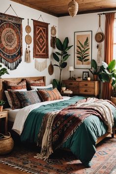 a bed room with a neatly made bed and lots of hanging decorations on the wall