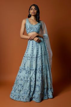 Sky blue lehenga with an attached cancan and 3D floral and sequins embroidery. Comes with a padded blouse and a dupatta. - Aza Fashions Sky Blue Lehenga, Mehendi Bridal, Reception Cocktail, Sequins Blouse, Blouse Lehenga, Net Lehenga, Embroidered Lehenga