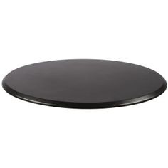 a round black table top on a white background