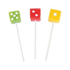 three candy lollipops with dice on them