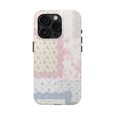 an iphone case with pink and blue flowers on white fabric, showing the back cover