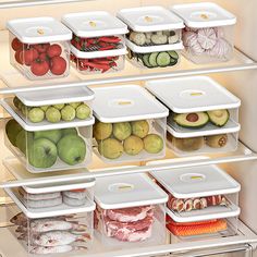 an open refrigerator filled with lots of different types of vegetables and fruit in plastic containers