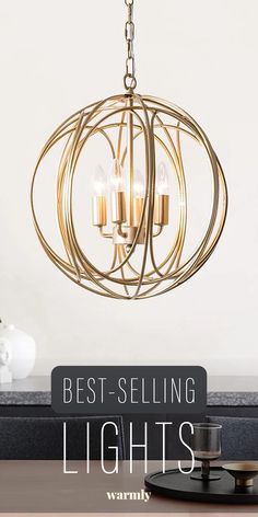 a chandelier hanging from the ceiling with candles in it and text overlay saying best - selling lights warms