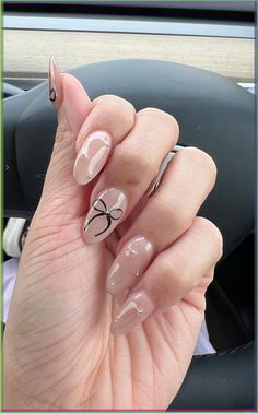 Get inspired by 30  adorable bow nail designs, from cute 3D bow nails to short and sweet styles in pink, red, white, gold, and black. This also includes coquette nails, ribbon nails, short bow nails, french tip bow nails, bow nail art. (📷 syne_k IG) Black Bow Nails, Ribbon Nails, Nails Bow, Short Bow, Bow Nail Designs, Pink White Nails, Bday Nails, Coquette Nails, Bow Nails