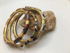 "3 Brass bangles bracelets in one price . they really gorgeous enamel work on it . one is white with blue, second is red with blue,third is butterfly blue with baby Blue. they set on brass. they messers about 3\" inside opening 2 1/2 . some of enamels has gone but they still giveing great looking.  Please look at pictures for more details." Bangle Stack, Bracelet Butterfly, Etsy Jewellery, Dope Jewelry Accessories, Vintage Bangle Bracelets, Butterfly Blue, The Bangles, Brass Bangle, Enamel Bangle