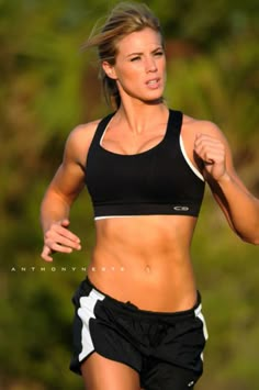 a woman running in a sports bra top