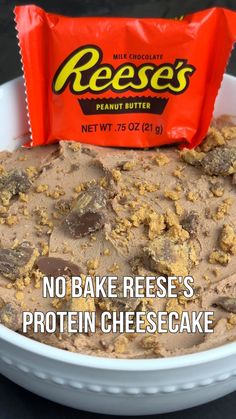 no bake reese's protein cheesecake in a bowl with a bag of reese's peanut butter