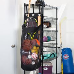 You're all athletes in your house. No sport goes unplayed which is why this sports equipment storage bag is your MVP. The mesh bag lets you easily see and access balls anywhere in the bag, whether it's a basketball, football or soccer ball. The hooks hang conveniently over any door and there's also room for storage for baseball bats, hockey and lacrosse sticks and tennis rackets. When the final whistle blows, drop them all in the sports storage and head for the dinner table. It's time to feed the home team. Honey-Can-Do Sports Equipment Organizer Rack - Wall Mounted Storage for Balls, Rackets, Bats - Convenient Over-the-Door Design Polyester in Black Workout Storage, Sports Equipment Organization, Sports Equipment Storage, Casa Garage, Sports Storage, Gear Storage, Football Or Soccer, Garage Organize, Ball Storage