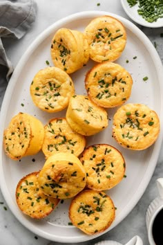 several small pastries on a white plate