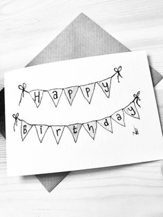 a card that says happy birthday with bunting flags on the front and bottom, in black ink