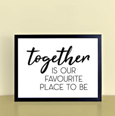 a black and white print with the words together is our favorite place to be