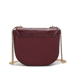 Introducing our Brooklyn Crossover Handbag, a captivating blend of high-quality vegan leather, faux crocodile-embossed detailing, and opulent gold-tone hardware. With dimensions of 8.6" W x 7.5" H x 3" D, this accessory seamlessly combines style and practicality. The shoulder strap extends to 24 inches for versatile wear, while the interior boasts thoughtful details, including a wall zip pocket and one slip pocket. The fabric lining adds a touch of luxury, and the flip lock fastening ensures both security and sophistication. Elevate your ensemble with this chic and compact accessory designed to make a statement.Product Care : Dry cleanMaterial : LeatherCountry of origin : China Golden Chain, Bootie Sandals, Daily Essentials, Small Accessories, Tie And Pocket Square, Leather Care, Shoulder Purse, Toddler Girl Outfits