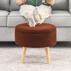 Constructed of soft fleece with solid wood legs, this ottoman comes with storage for your magazines, kids' toys, blankets and more. Ottoman With Tray, Storage Ottomans, Future Apartment, Foot Stool, Store Organization, Storage Ottoman, Storage And Organization, Storage Furniture, Wood Legs