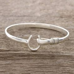 Sterling Silver Horseshoe Bangle Bracelet from India - Horseshoe Fortune | NOVICA Horseshoe Pendant, Hook Bracelet, Silver Bangle Bracelet, Sterling Silver Bangle Bracelets, Fashion 2016, Sterling Silver Bangle, Sterling Silver Dangle Earrings, Silver Bangle Bracelets, Hook Clasp