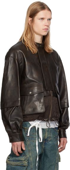 Oversized buffed lambskin and quilted PU-coated twill jacket. · Paneled construction · Press-stud tab at band collar · Two-way zip closure with press-stud placket · Flap and welt pockets · Bungee-style drawstring at hem · Pleats at adjustable single-button barrel cuffs · Logo-engraved rivets at back collar · Welt pockets at interior · Partial stretch cotton corduroy lining Supplier color: Brown Twill Jacket, Brown Leather Jacket, Leather Jacket Black, Band Collar, Leather Jacket Men, Quilted Jacket, Rivets, Welt Pockets, Stretch Cotton