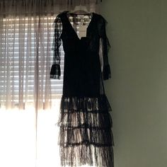 Long Sleeve Black Lace Dress - $179 Value - Perfect For Wedding Guest Or Cocktail Dress. Never Worn, Tags Still On. Beautiful Lace And Detail. Evening V-neck Lace Dress With Ruffles, Sheer V-neck Lace Dress For Evening, Evening Lace V-neck Dress With Ruffles, Elegant Black Mini Dress For Wedding, Black Floor-length Evening Dress With Lace Trim, Black Lace Trim Floor-length Evening Dress, Black Sheer Maxi Evening Dress, Black Sheer Maxi Length Evening Dress, Black Long Sleeve Summer Evening Dress