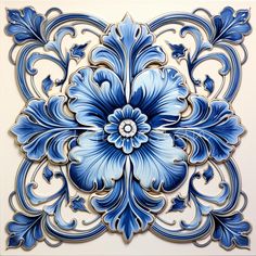 an intricately designed tile with blue flowers on it