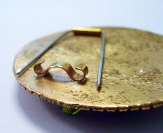 a gold plate with some scissors on it