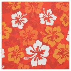 an orange and white hawaiian flower print fabric with large flowers on the bottom half of it