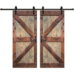 two wooden doors with metal bars on them