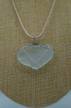 Ice Aqua Silky Sea Glass Pendant: Heart Shape (P#77) Sea Glass Heart, Pendant Heart, Sea Glass Pendant, Sea Glass Art, Glass Heart, Cotton Cord, Glass Pendant, Glass Pendants, Heart Shape