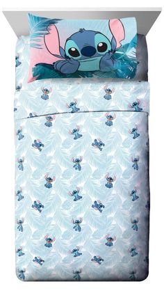 the little mermaid bedding set is blue and has an adorable cartoon character on it