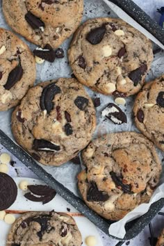 chocolate chip cookies and white chocolate chips on a tray