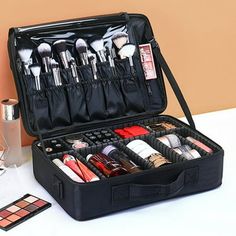 Description: This travel makeup organizer is a must-have for makeup artists, hairstylists, and beauty enthusiasts. Crafted from waterproof oxford cloth, it is sturdy and durable, ensuring long-lasting use. The smooth metal zippers add to its durability. With shoulder straps and handles, it is lightweight and portable, perfect for on-the-go use. The organizer features 3 levels of storage space, ideal for storing various cosmetics and tools. The top layer includes a thermal insulation layer to protect cosmetics from temperature changes. The adjustable bottom divider accommodates cosmetics of different lengths. Whether for weddings, events, or travel, this versatile organizer is a convenient solution for all your makeup needs. Item Name: Tool Bag Material: Oxford Cloth Features: Large Capacit Make Up Storage, Makeup Storage Organization, Makeup Storage Box, Makeup Storage Bag, Makeup Needs, Women Cosmetics, Makeup Box, Beauty Case, Black Hot Pink