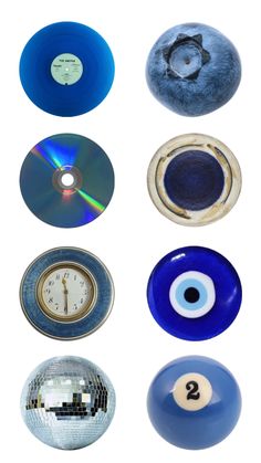 several different types of objects are arranged in the shape of circles and balls, including a clock