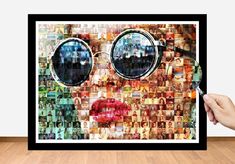 a person holding up a framed photo with many pictures on it and the image has been altered to look like he is wearing glasses