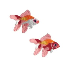 two red and yellow fish are shown in the shape of an embroidered applique