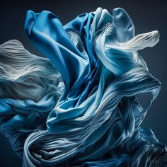 blue and white fabric blowing in the wind